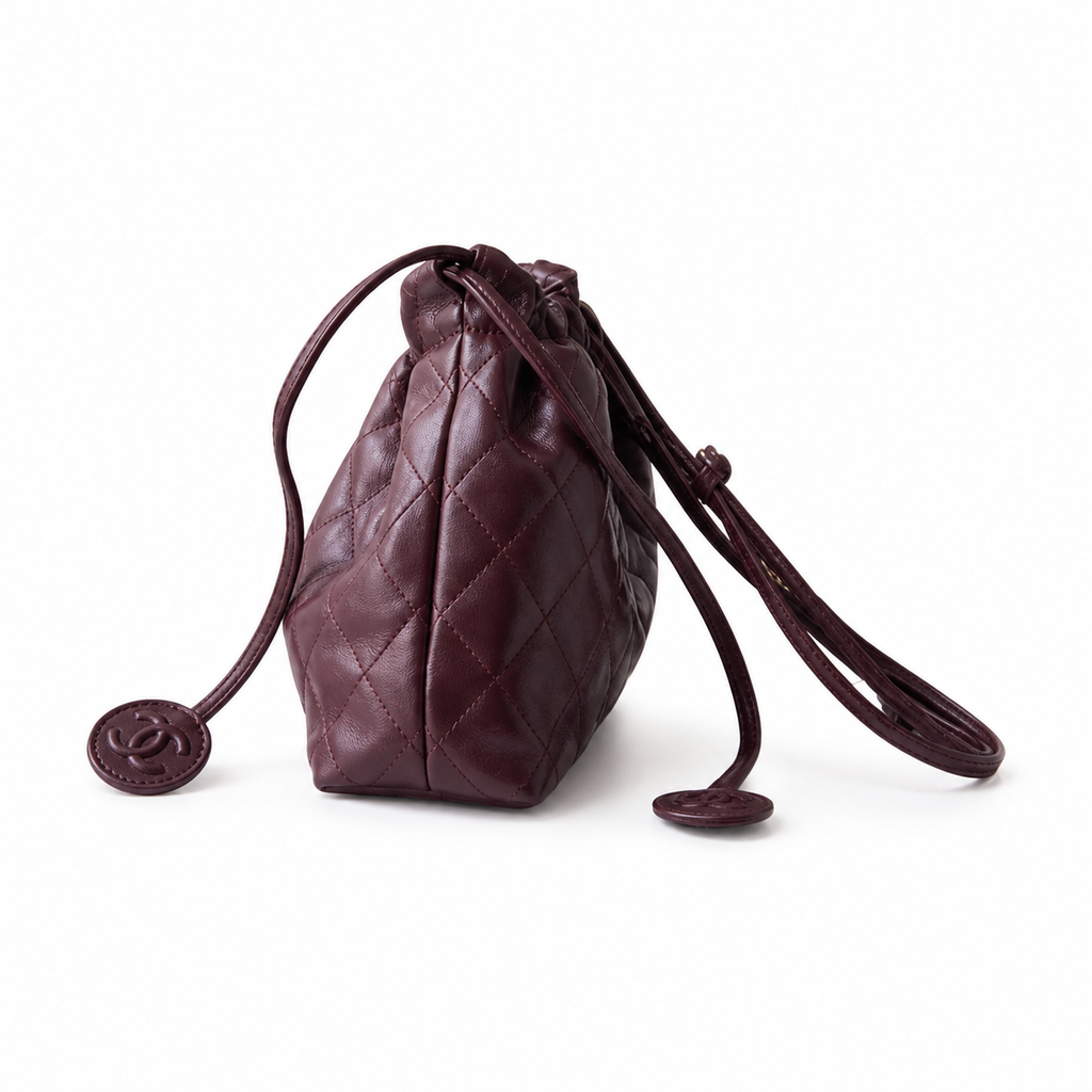 Chanel Burgundy Quilted Lambskin Drawstring Bucket | Tonal CC Coin Discs & Gold CC — 22cm